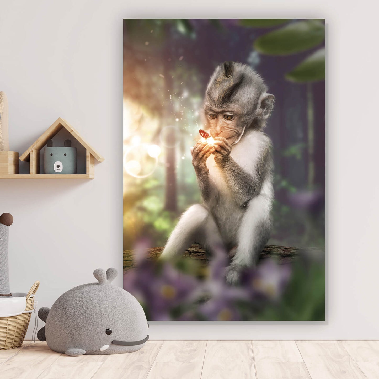 Leinwandbild Babyaffe mit Schmetterling Hochformat