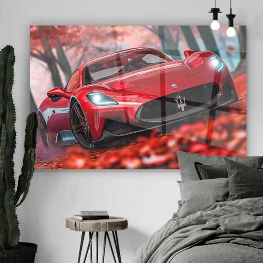 Acrylglasbild Roter Sportwagen im Herbstwald Querformat