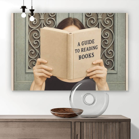 Leinwandbild Eine Frau liest ein Buch Querformat
