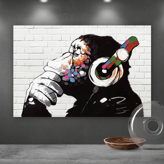 Leinwandbild Banksy Bunter Affe mit Kopfhörern Querformat